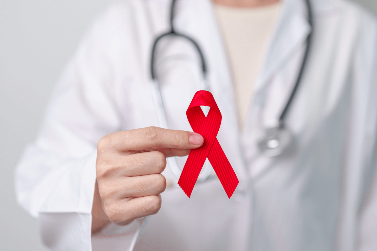 HIV Heilung Symbolbild: Aids-Schleife. Englisch: HIV cure Symbolic image: Aids ribbon.