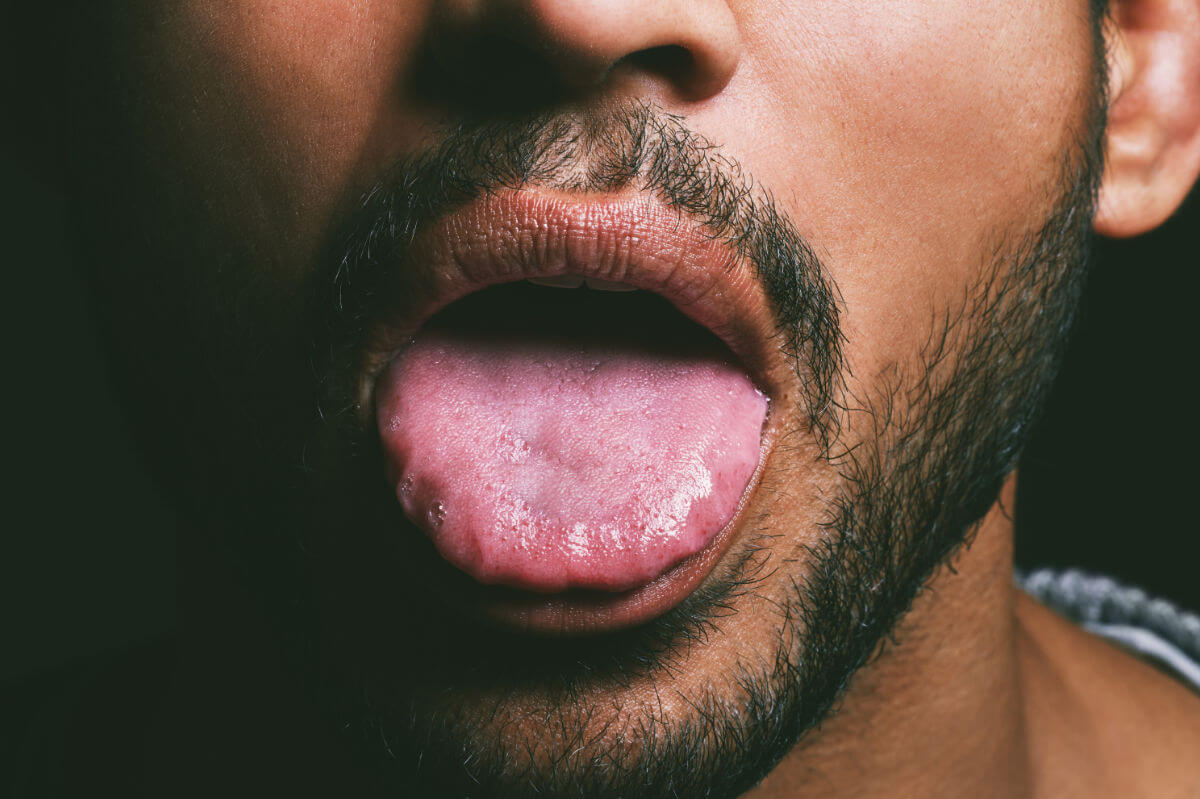 Sloppy Blowjob Symbolbild: Männerzunge Englisch: Sloppy blowjob symbol image: male tongue